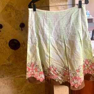 Tahari Sandpipe women’s skirt size 12. Green, pink, brown and white. Pleated.